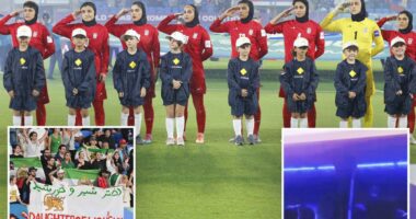 Iranian womenâs soccer players flash 'help' signal after being branded traitors
